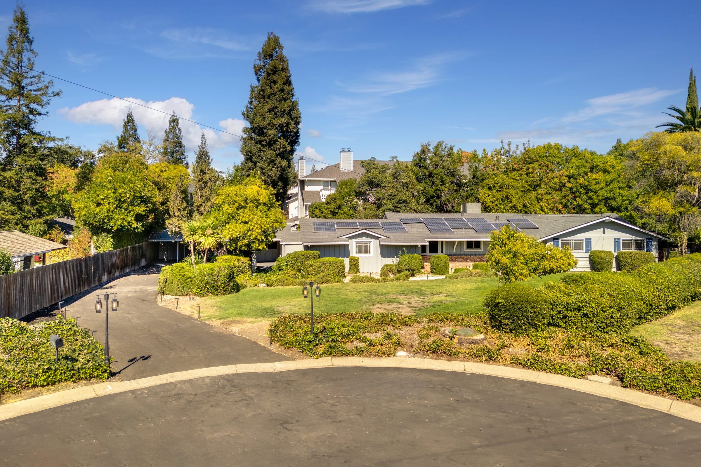 48 Kingston Place. The house from the cul-de-sac, behind its front lawn and driveway.