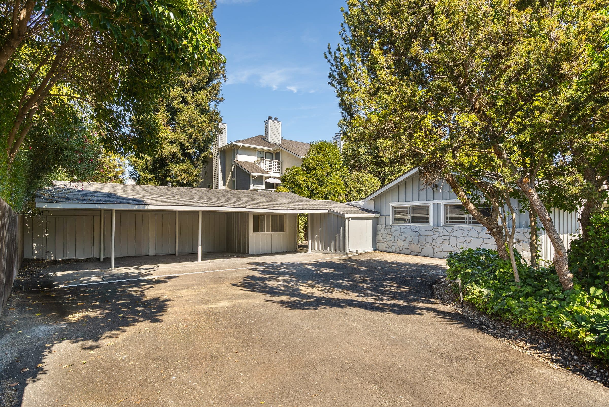 48 Kingston Place. The motor court and the three-space carport.