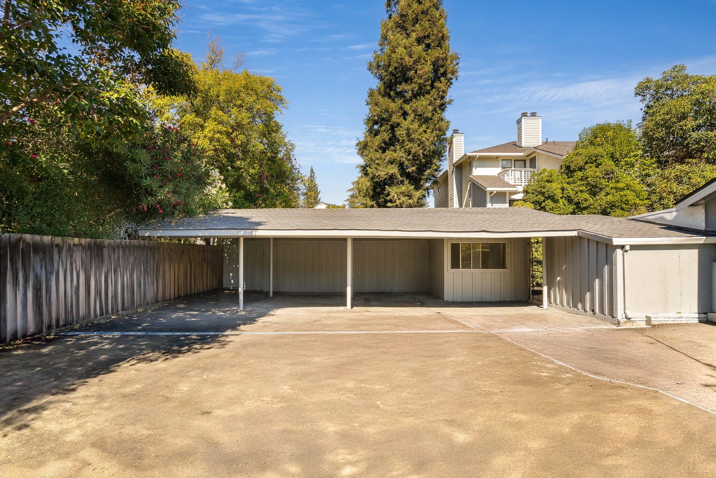 48 Kingston Place. The three-space carport off the motor court.