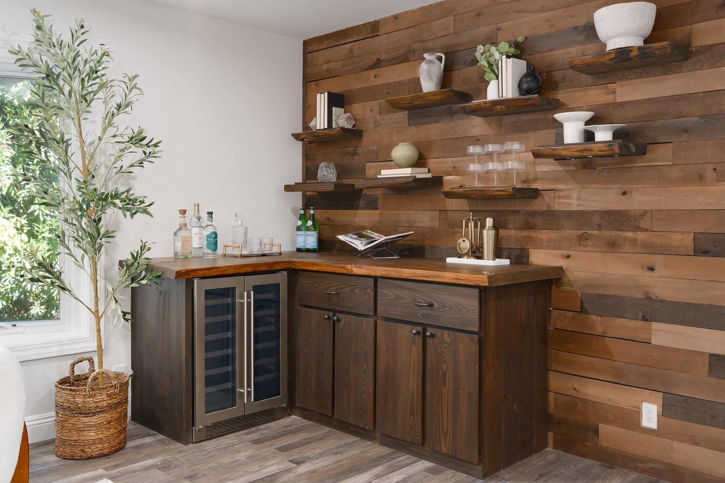 48 Kingston Place. The bar and wood-paneled wall in the living room.