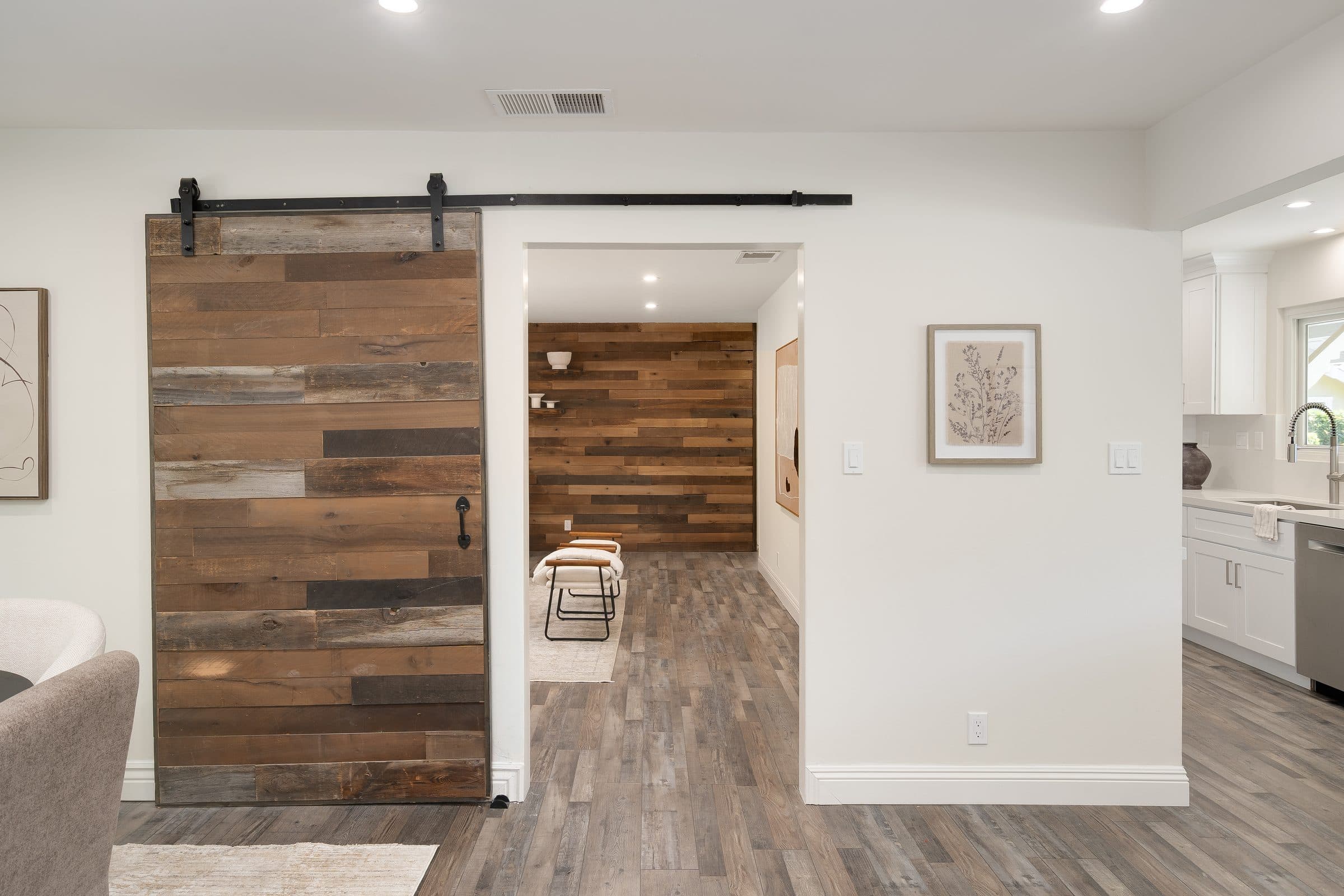 48 Kingston Place. The sliding barn door between the dining area and the living room.